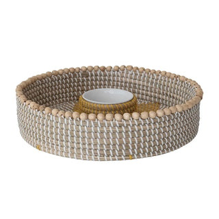Round hand-woven seagrass chip‑and‑dip basket with white and natural weave and a ceramic dip bowl.