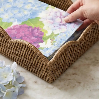 Blue hydrangea hostess gift set with floral napkins in a woven basket