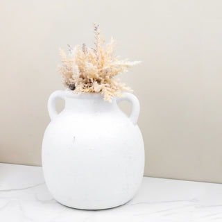 White ceramic two-handle jug vase with dried pampas arrangement