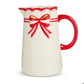 Red Bow Pitcher ceramic holiday decor with red handle and gold-accent bow