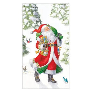 Guest towel napkin featuring Woodland Santa in a red suit with gifts, set in a snowy forest scene.
