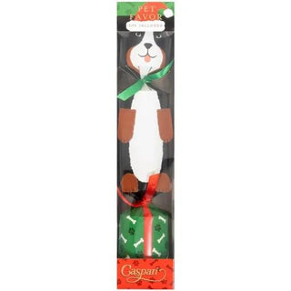 Christmas cracker dog toy featuring a white and brown dog with a green bow and red ribbon in clear packaging