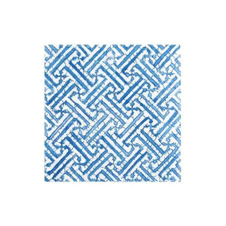 Cocktail napkin with blue fretwork pattern, decorative geometric print