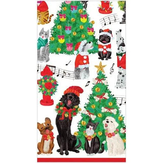 Guest towel napkin featuring colorful dogs and cats caroling beside decorated Christmas trees.