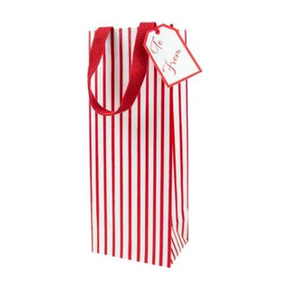 Bottle bag with red-and-white stripes, red handles, and a gift tag.