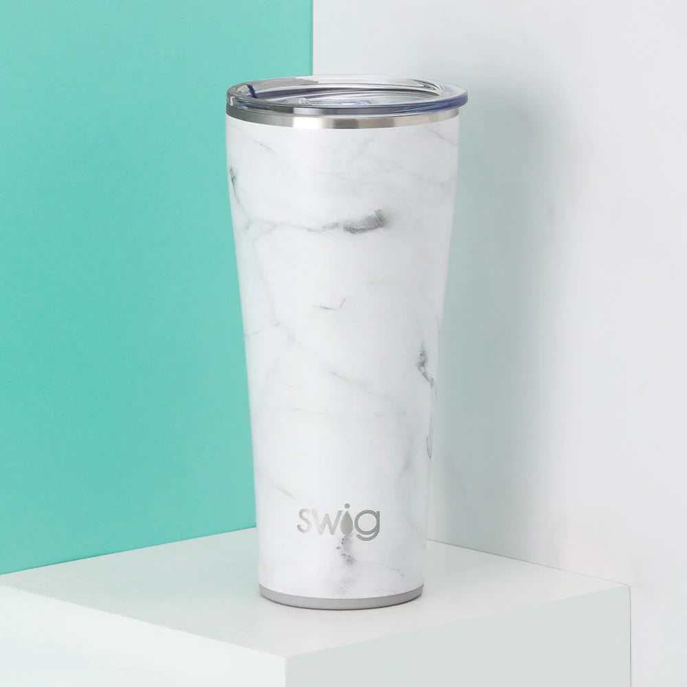 https://www.opalandolive.com/cdn/shop/files/swig-life-signature-32oz-insulated-stainless-steel-tumbler-marble-lifestyle-colorblock.webp?v=1690736553&width=1920