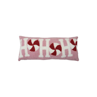 Cotton terry cloth lumbar pillow with Ho Ho Ho candy motif on pink, white and red, featuring white letters.