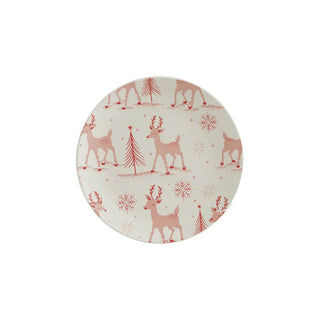 Stoneware dinner plate with pink reindeer, trees and snowflakes pattern on white background