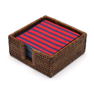Caspari rattan cocktail napkin holder in natural finish with red and blue striped napkins