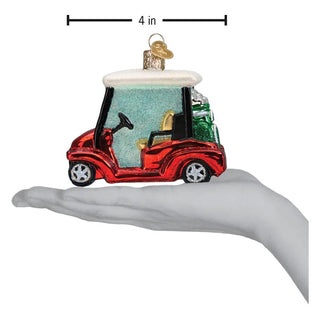 Glass golf cart ornament, red with white roof and green golf bag, 4 in.